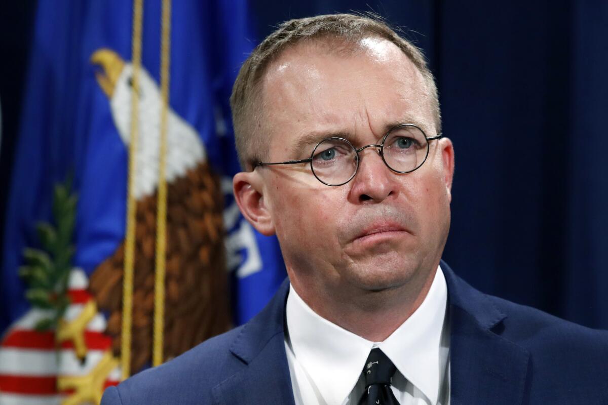 Acting White House Chief of Staff Mick Mulvaney, shown in July 2018, has been floundering in recent days because of comments he made suggesting that he held up aid to Ukraine to pressure the country to investigate allegations that Russians had not, in fact, hacked into Democratic National Committee computers in 2016.