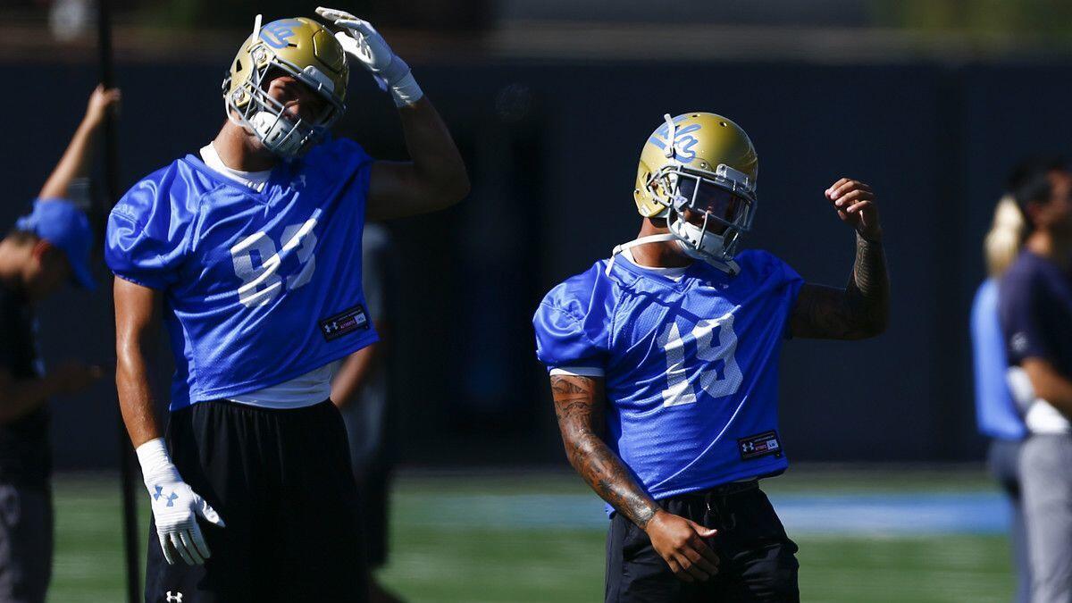 UCLA running back Kazmeir Allen (19) participates in warmups during the first day of Fall Camp for the Bruins at UCLA's Wasserman Football Center on Aug. 3.