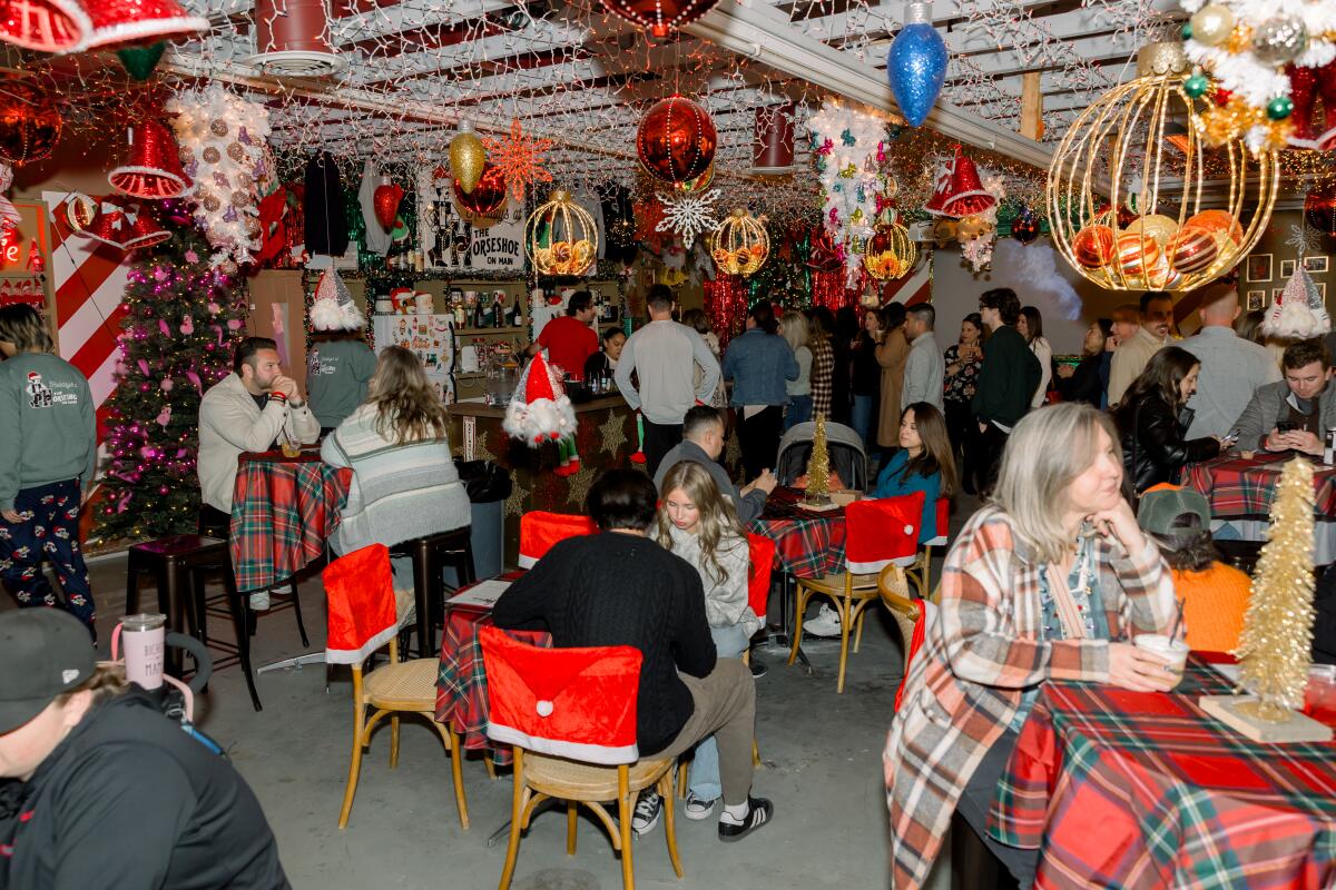 The Horseshoe on Main transforms a warehouse in downtown Newhall into a holiday-themed pop-up bar.