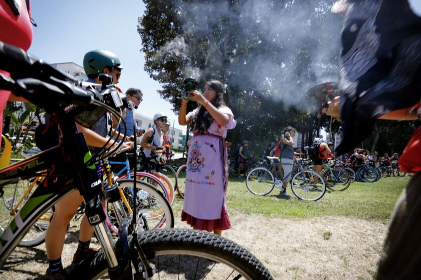 A blessing before the 30-mile ride begins. This was the third massive ride for the Ovarian Psycos Cycle Brigade, who are encouraging other women -- especially those who haven't been on a bike since they were in pigtails -- to pick up where their inner child left off.