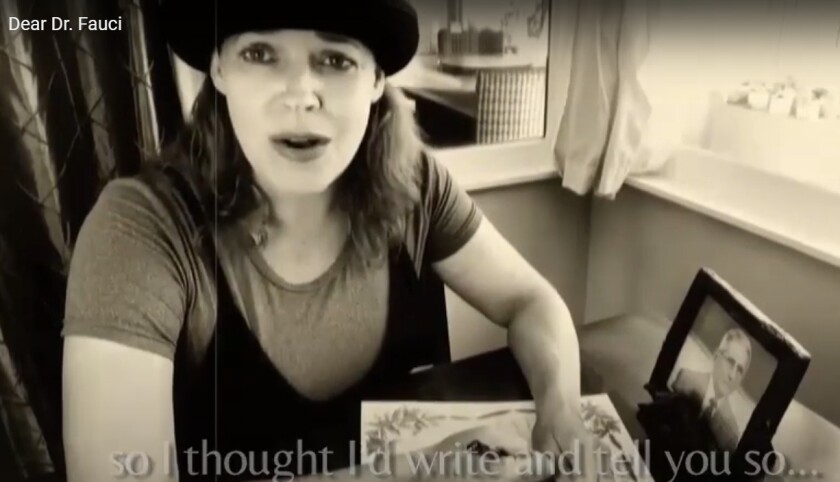Vista actor Bets Malone sings the parody song she composed in the sepia-toned "Dear Dr. Fauci" video.
