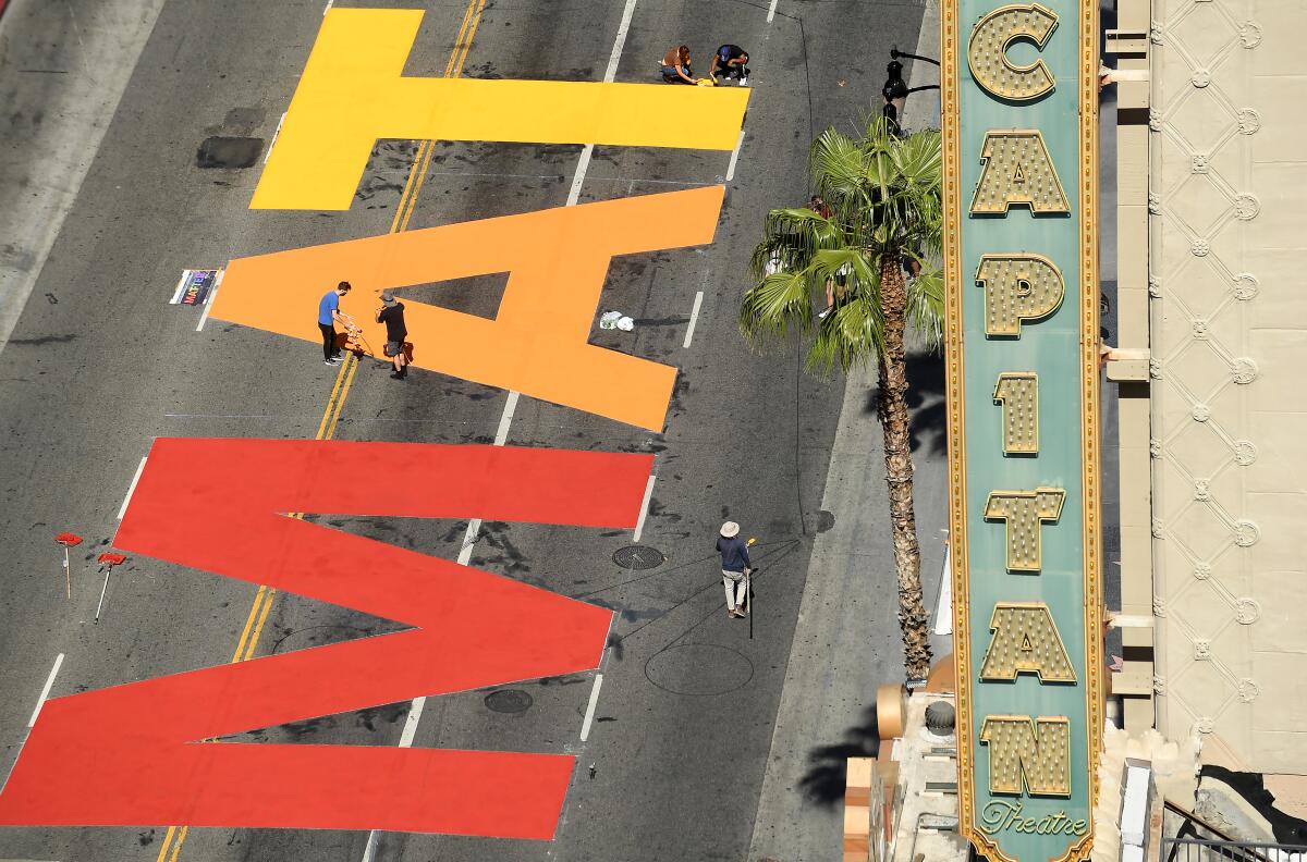 "All Black Lives Matter" is painted on Hollywood Boulevard. 