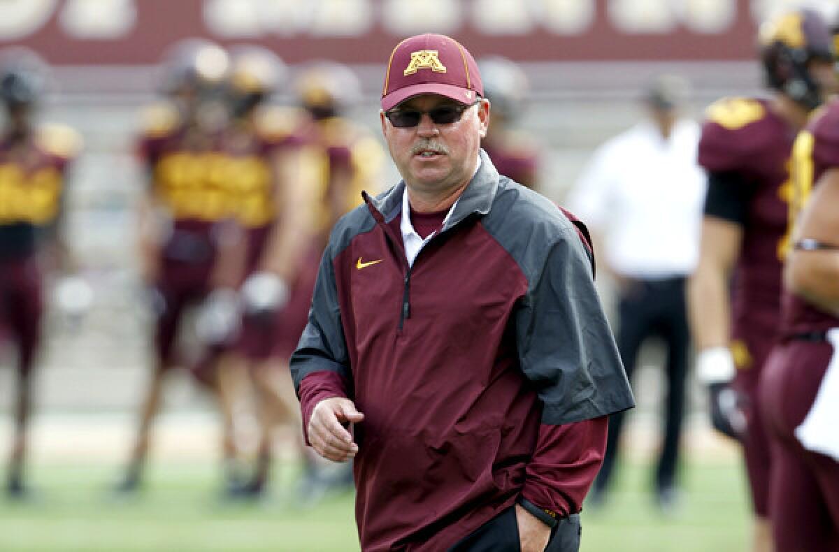 Minnesota Coach Jerry Kill watches his team warm up for a game against San Jose State earlier this season.