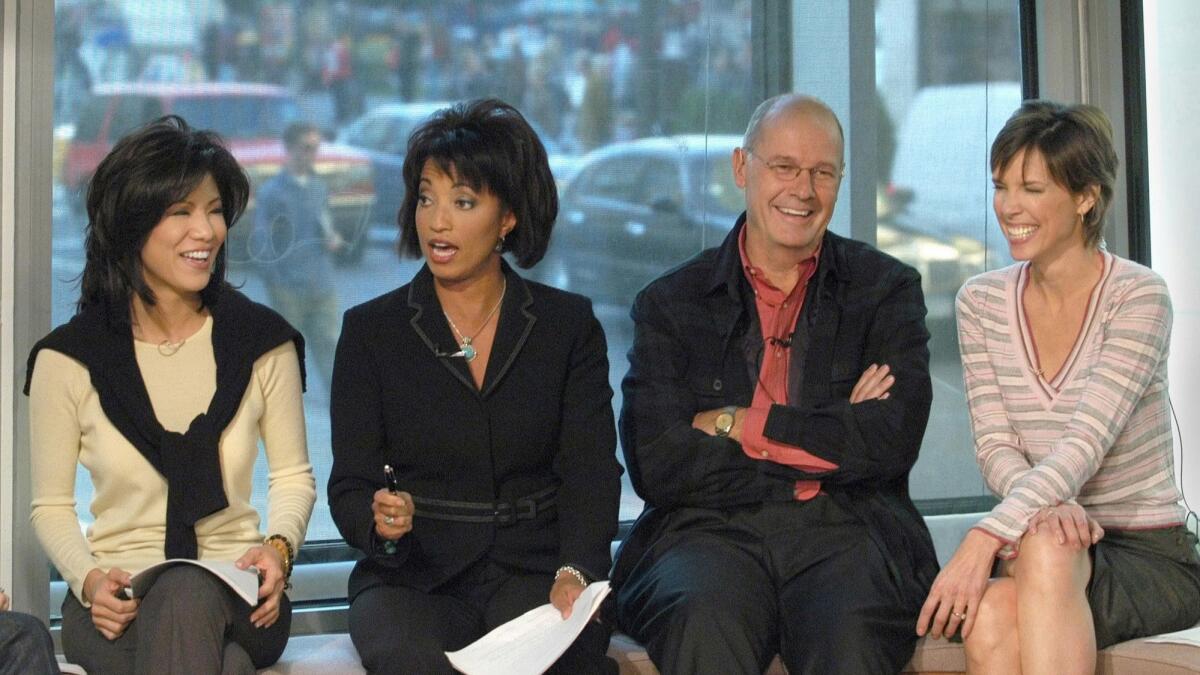 The four new anchors for CBS's "Early Show" — Julie Chen, left, Rene Syler, Harry Smith and Hannah Storm — share a laugh on the set in New York during rehearsals on Oct. 22, 2002.