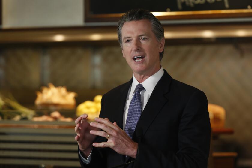 Gov. Gavin Newsom announces new criteria related to coronavirus hospitalizations and testing that could allow counties to open faster than the state, during a news conference at Mustards Grill in Napa, Calif., Monday May 18, 2020. Newsom says the new criteria could apply to 53 of the state's 58 counties. (AP Photo/Rich Pedroncelli, Pool)