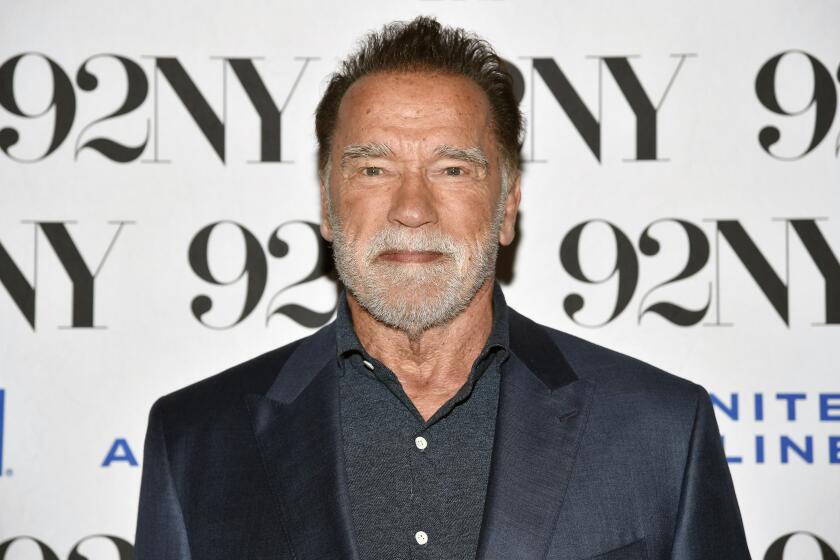 Arnold Schwarzenegger poses backstage before his live talk to discuss his book "Be Useful: Seven Tools for Life" at The 92nd Street Y on Tuesday, Oct. 10, 2023, in New York. (Photo by Evan Agostini/Invision/AP)