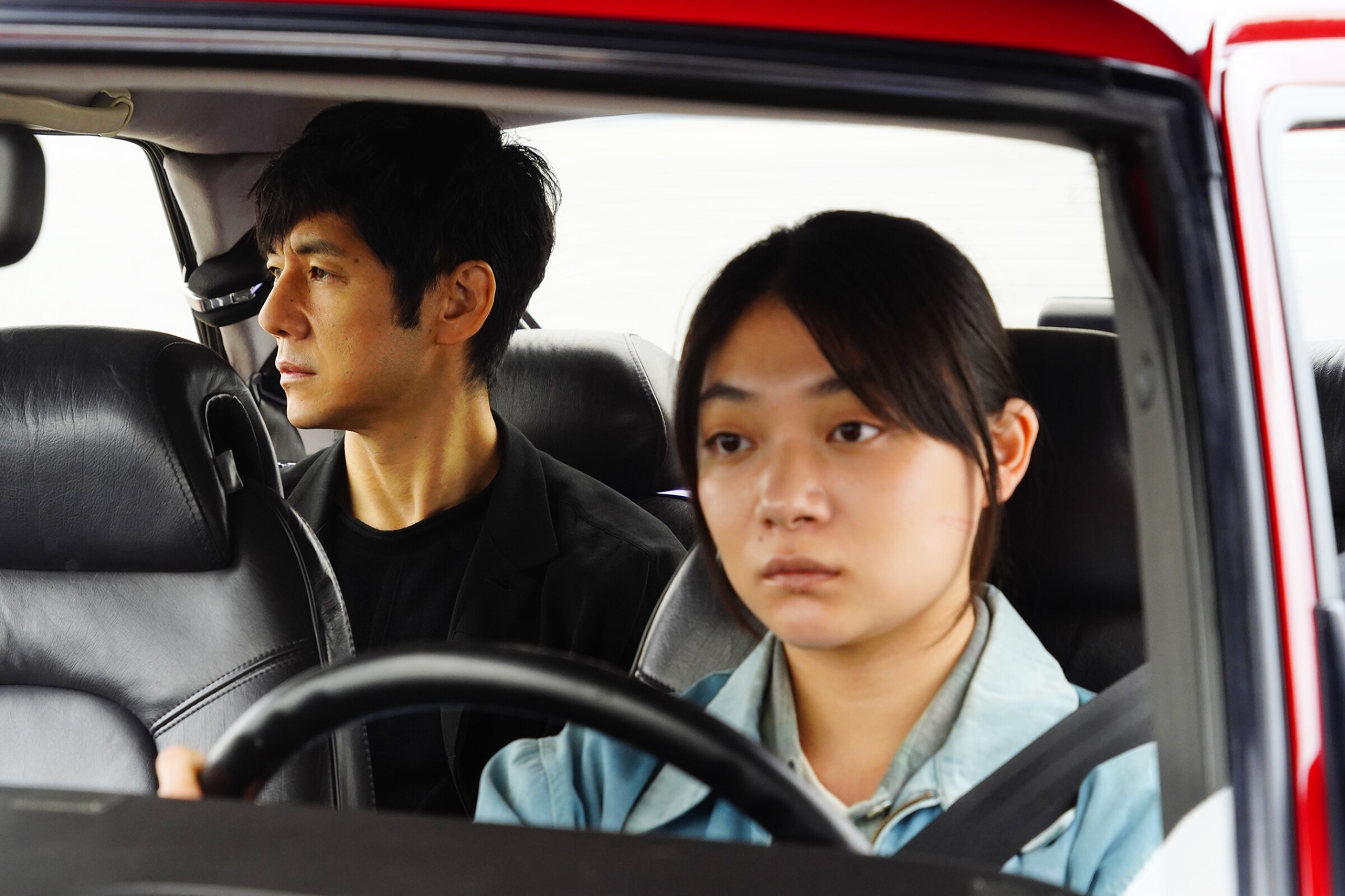 Hidetoshi Nishijima, left, and Tôko Miura in the movie “Drive My Car.”