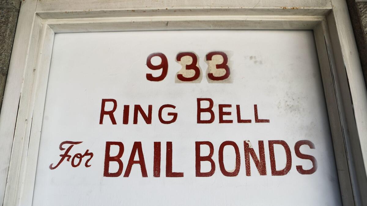 A sign advertises a bail bond company in Los Angeles. In the wake of a new law to make California the first state to abolish bail for suspects awaiting trial, the bail industry is seeking to overturn the law by a ballot referendum.