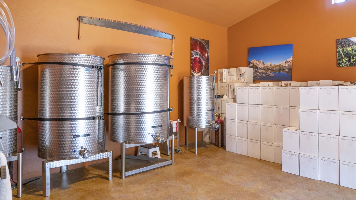 The wine room with machinery and supplies.