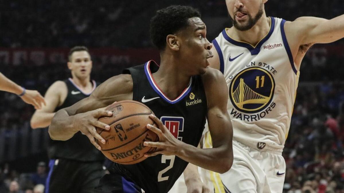 Clippers guard Shai Gilgeous-Alexander drives past Warriors guard Klay Thompson during third quarter of Game 4 of the NBA Western Conference quarterfinals on April 21.