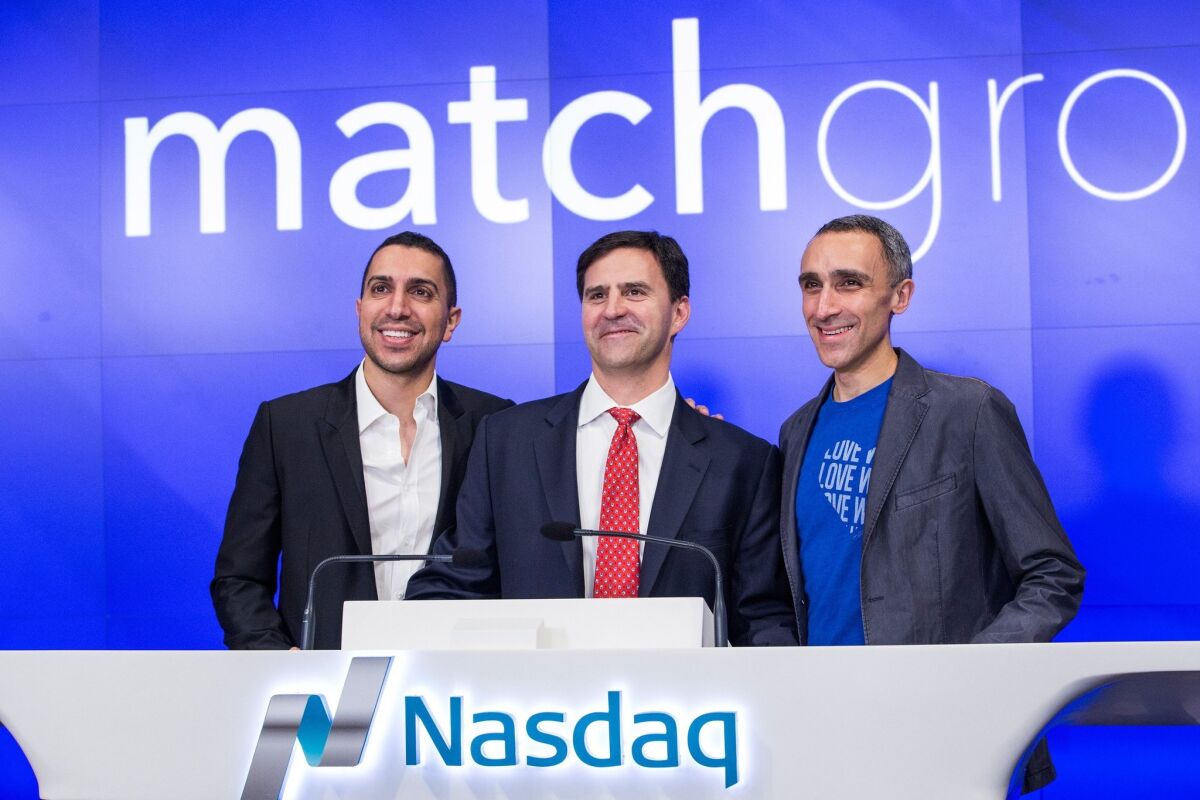 Tinder co-founder Sean Rad, left, with former Match Group CEO Greg Blatt, center, and OkCupid co-founder Sam Yagan. Blatt says in a defamation suit against Rad that Rad is using a sexual harassment claim by another former Tinder executive to discredit him in a lawsuit over Tinder's valuation.