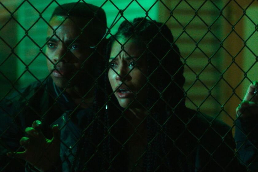 Joivan Wade and Lex Scott Davis in "The First Purge" movie.