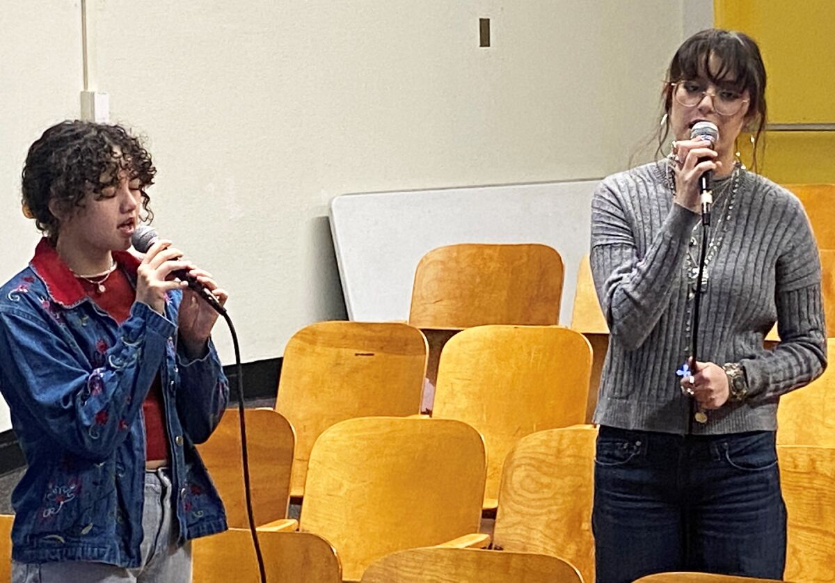 Senior vocalists Ava Strickland and Paulina Perez during a Mission Bay High School Swing Choir rehearsal.
