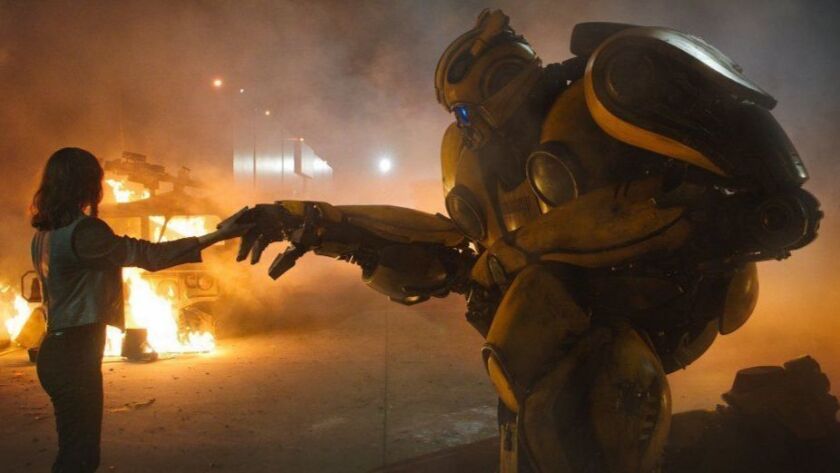 Hailee Steinfeld as Charlie with Bumblebee in the "Transformers" spinoff/prequel "Bumblebee."