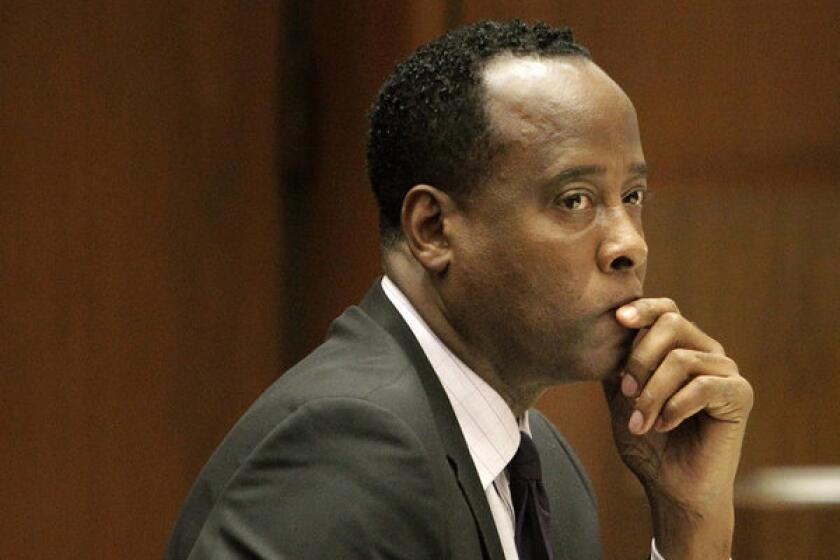 Dr. Conrad Murray, Michael Jackson's former physician, sits in a courtroom during his involuntary manslaughter trial in Los Angeles.