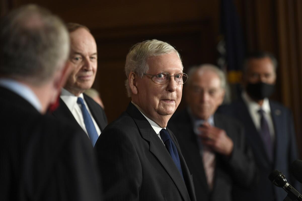 Senate Majority Leader Mitch McConnell and other Republicans on Capitol Hill.