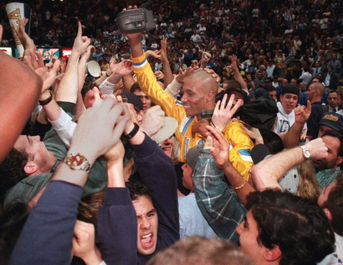 Charles O'Bannon celebrates UCLA's victory over Oregon in the Pac-10 tournament final on March 11, 1995.