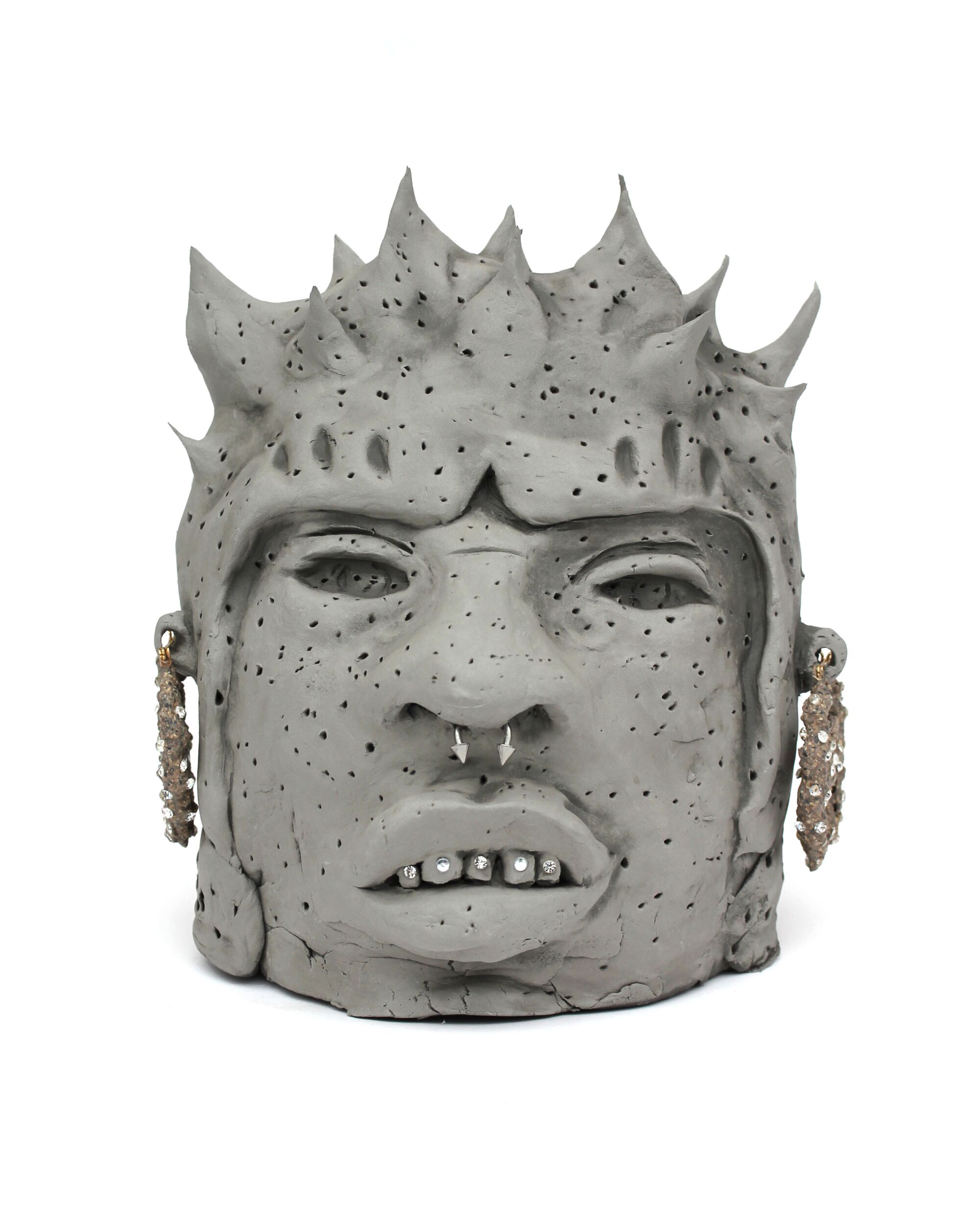 An Olmec head sculpture.