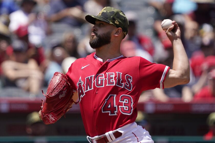 Los Angeles Angels starting pitcher Patrick Sandoval throws to the plate during the second inning.