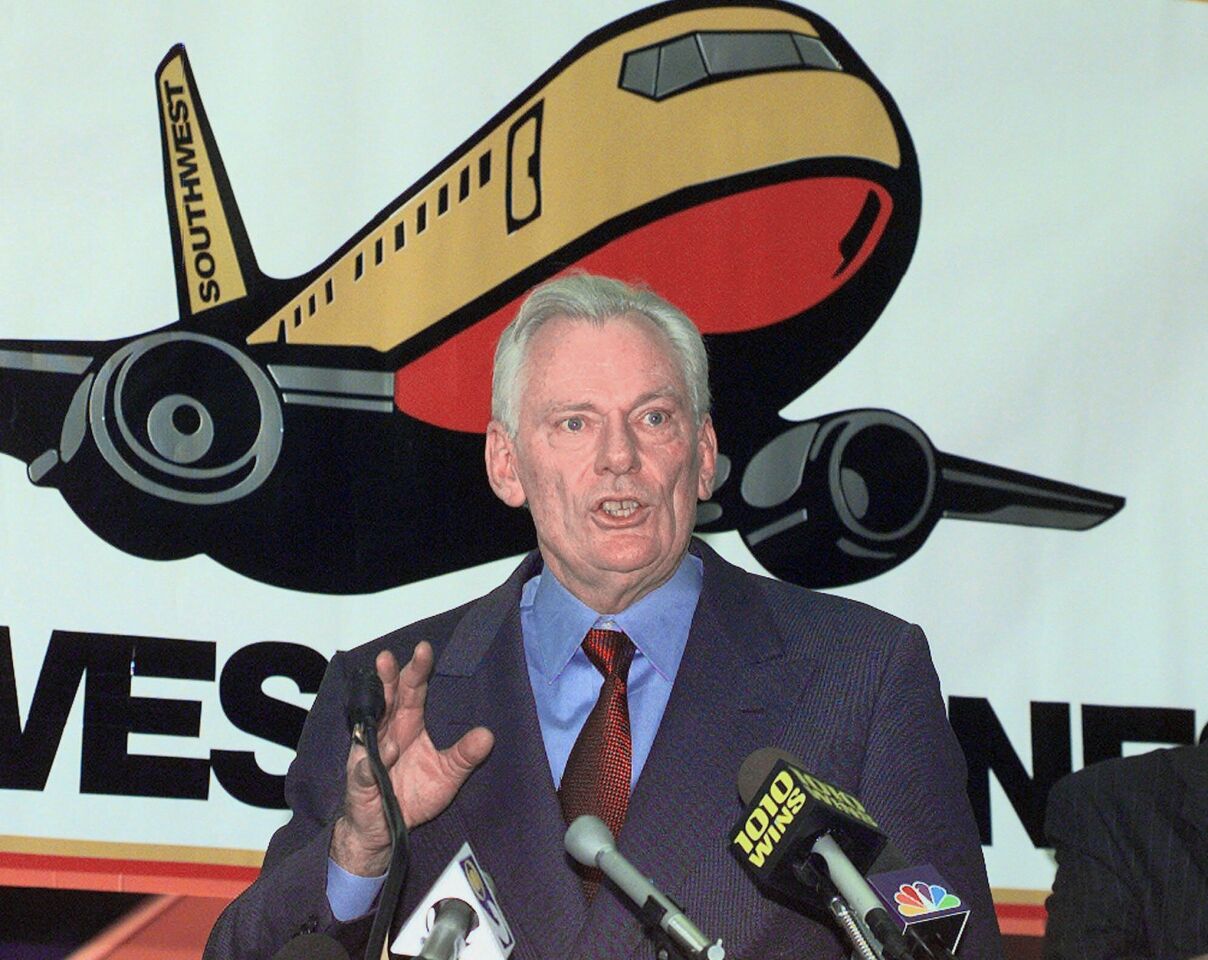 Southwest Airlines President and CEO Herb Kelleher speaks at a news conference at MacArthur Airport in Islip, N.Y., in December 1998.