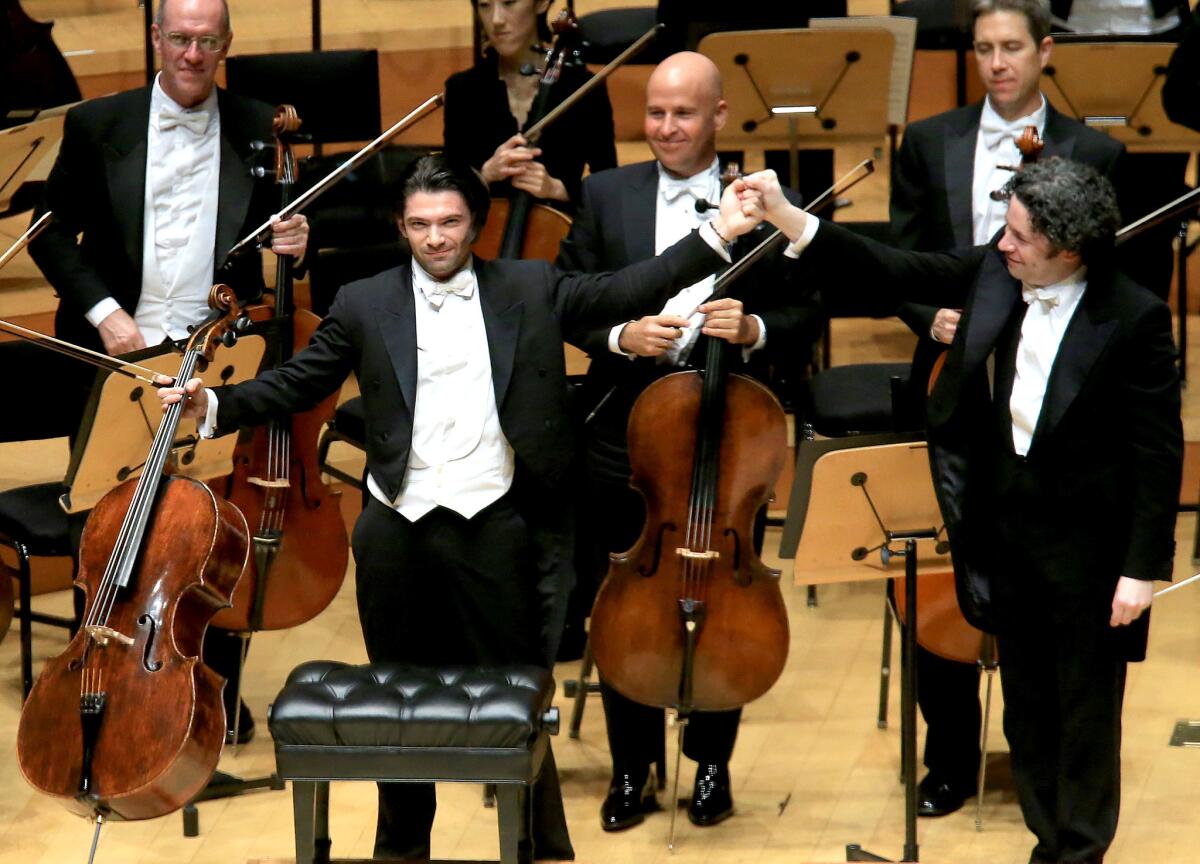 Gautier Capucon acknowledges the crowd after performing Haydn’s Cello Concerto in C Major with the L.A. Philharmonic at Disney Hall on Friday night.