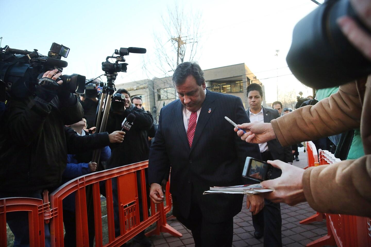 New Jersey Gov. Chris Christie enters the Borough Hall in Fort Lee, N.J., to apologize to Mayor Mark Sokolich.