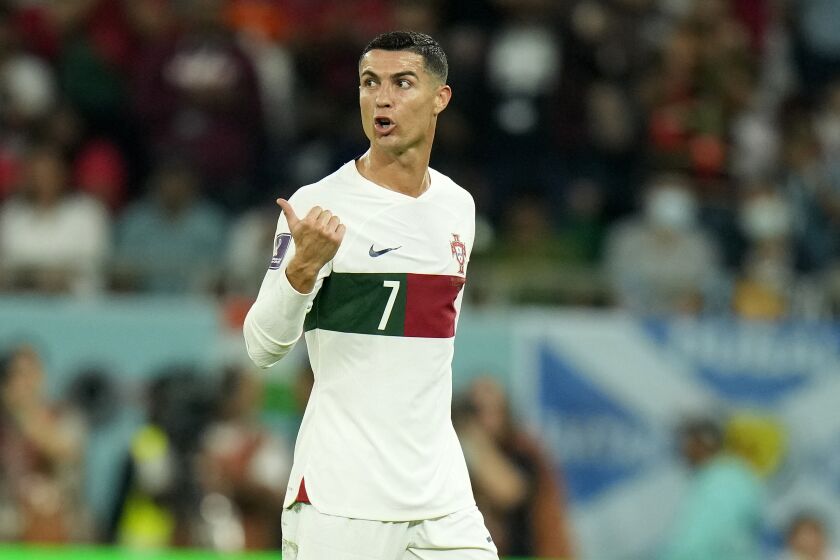 Portugal's Cristiano Ronaldo leaves the pitch after being substituted during the World Cup group H soccer match between South Korea and Portugal, at the Education City Stadium in Al Rayyan , Qatar, Friday, Dec. 2, 2022. (AP Photo/Francisco Seco)