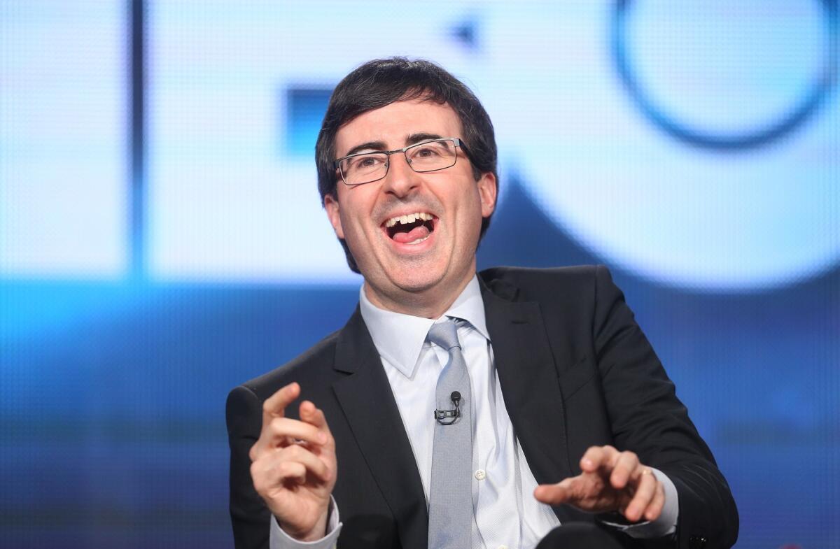 John Oliver speaks during the Television Critics Assn. media tour at the Langham Huntington Hotel in Pasadena.