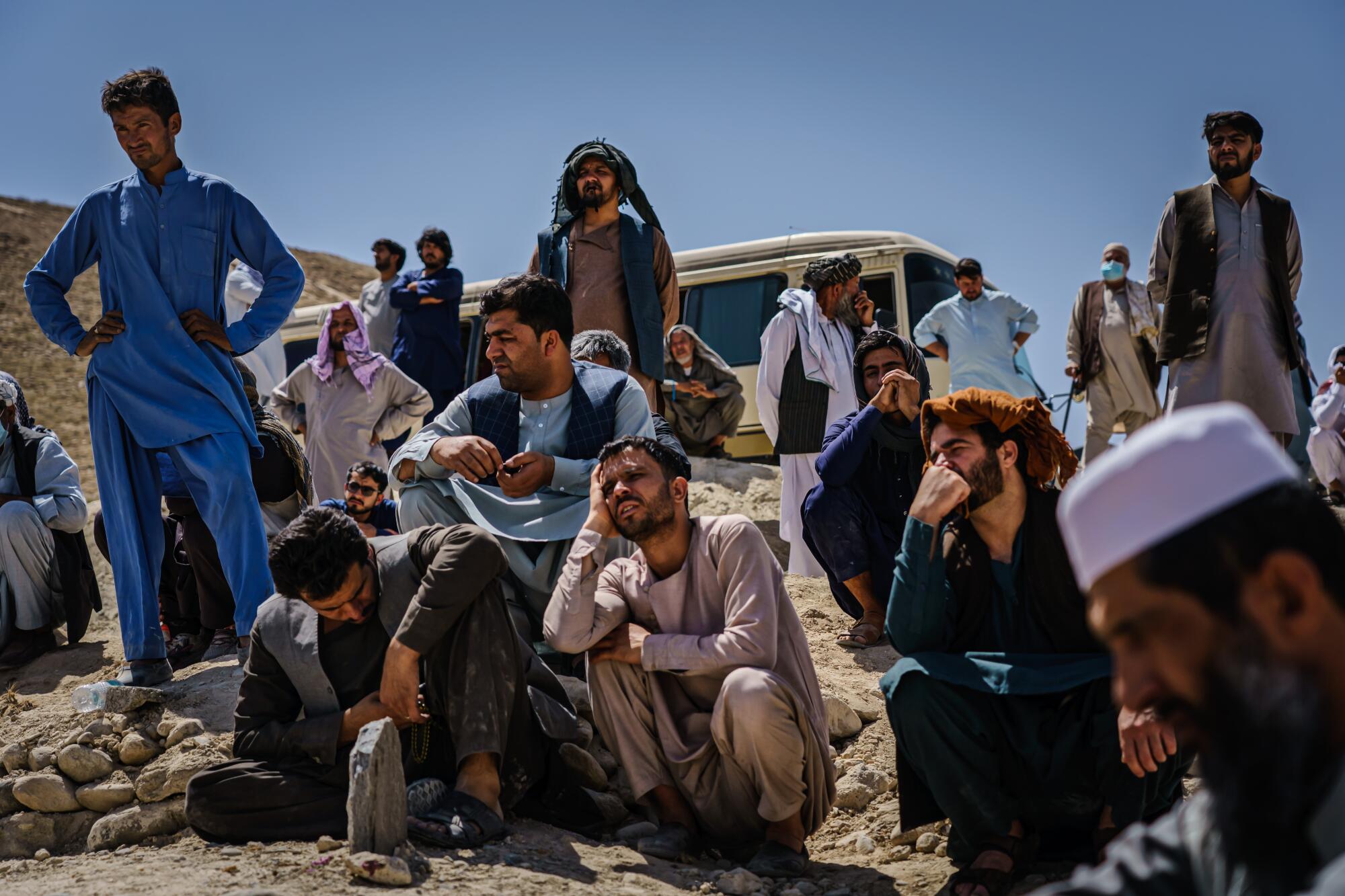 Relatives of Abdul Raoul grieve during his funeral.