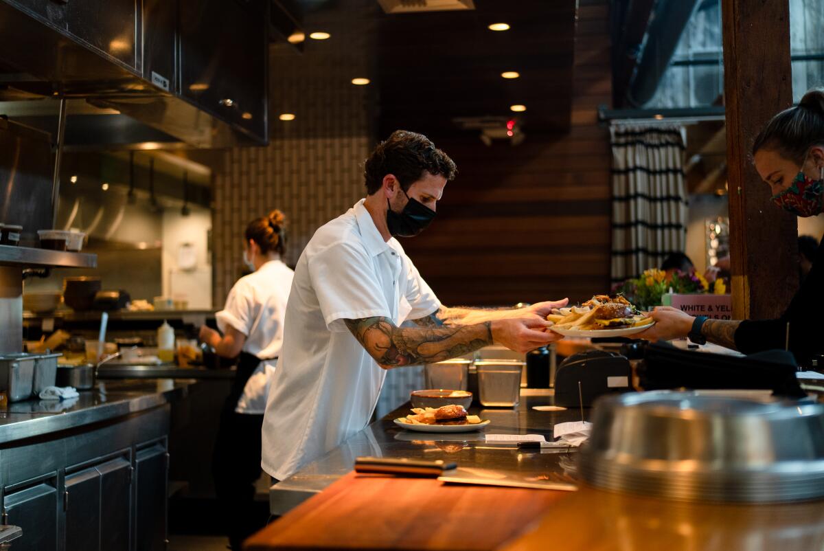 Juniper & Ivy executive chef Anthony Wells in the kitchen at the Little Italy restaurant.