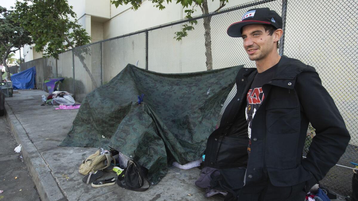 Andy Grabarkiewicz, 28, who is homeless, outside an encampment on 3rd Avenue in Venice.