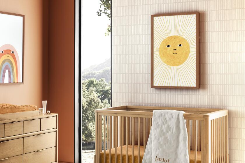 The Bodie Natural Oak Wood Convertible Baby Crib with Toddler Bed Rail, from Crate & Kids.