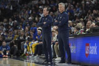 Golden State Warriors head coach Steve Kerr, right, and assistant coach Kenny Atkinson.