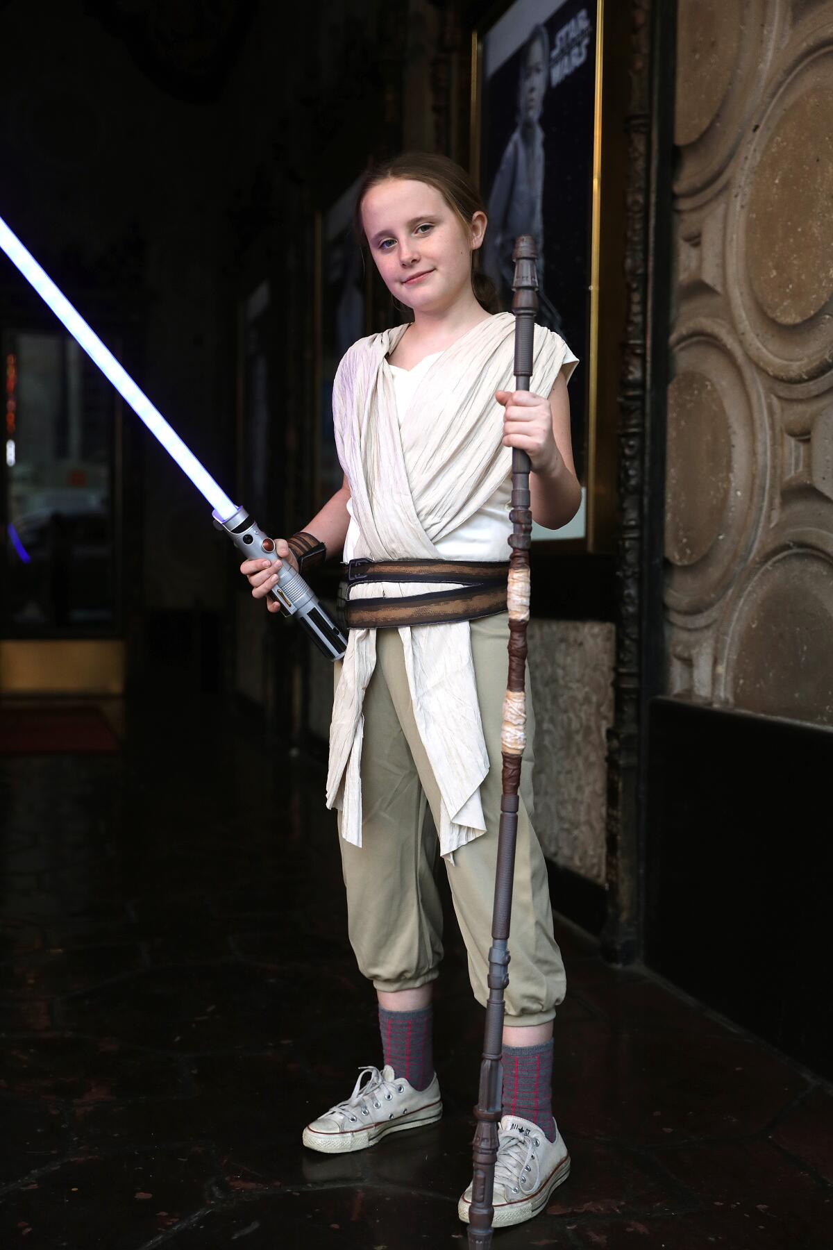Lindalee Rose, 11, of Los Angeles dressed as Rey for the “Star Wars” marathon at the El Capitan Theatre.