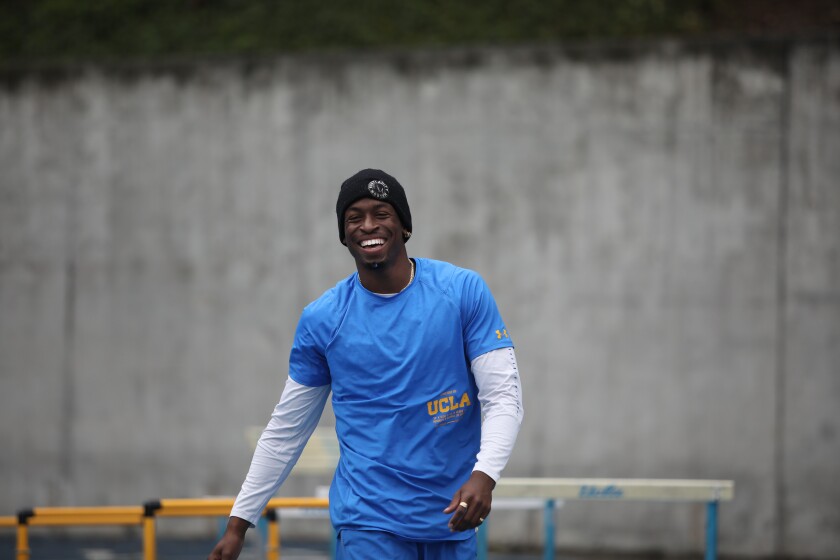 UCLA sprinter Kenroy Higgins II smiles while training for the 2020 NCAA indoor track championships.