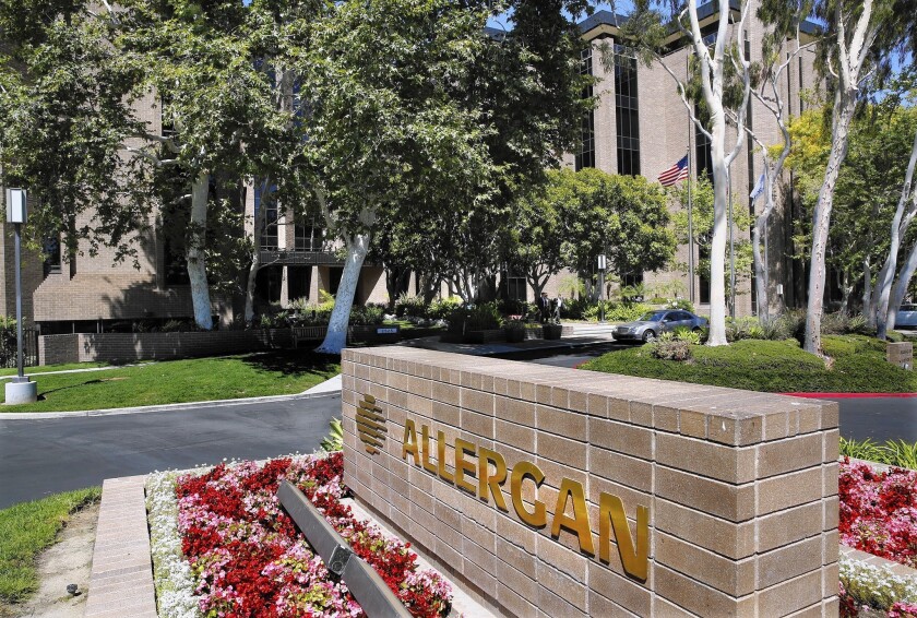 The CEO of Valeant Pharmaceuticals has suggested that Allergan is fat, overstaffed and ripe for big cuts to its research and development team. Above, Allergan's headquarters in Irvine.