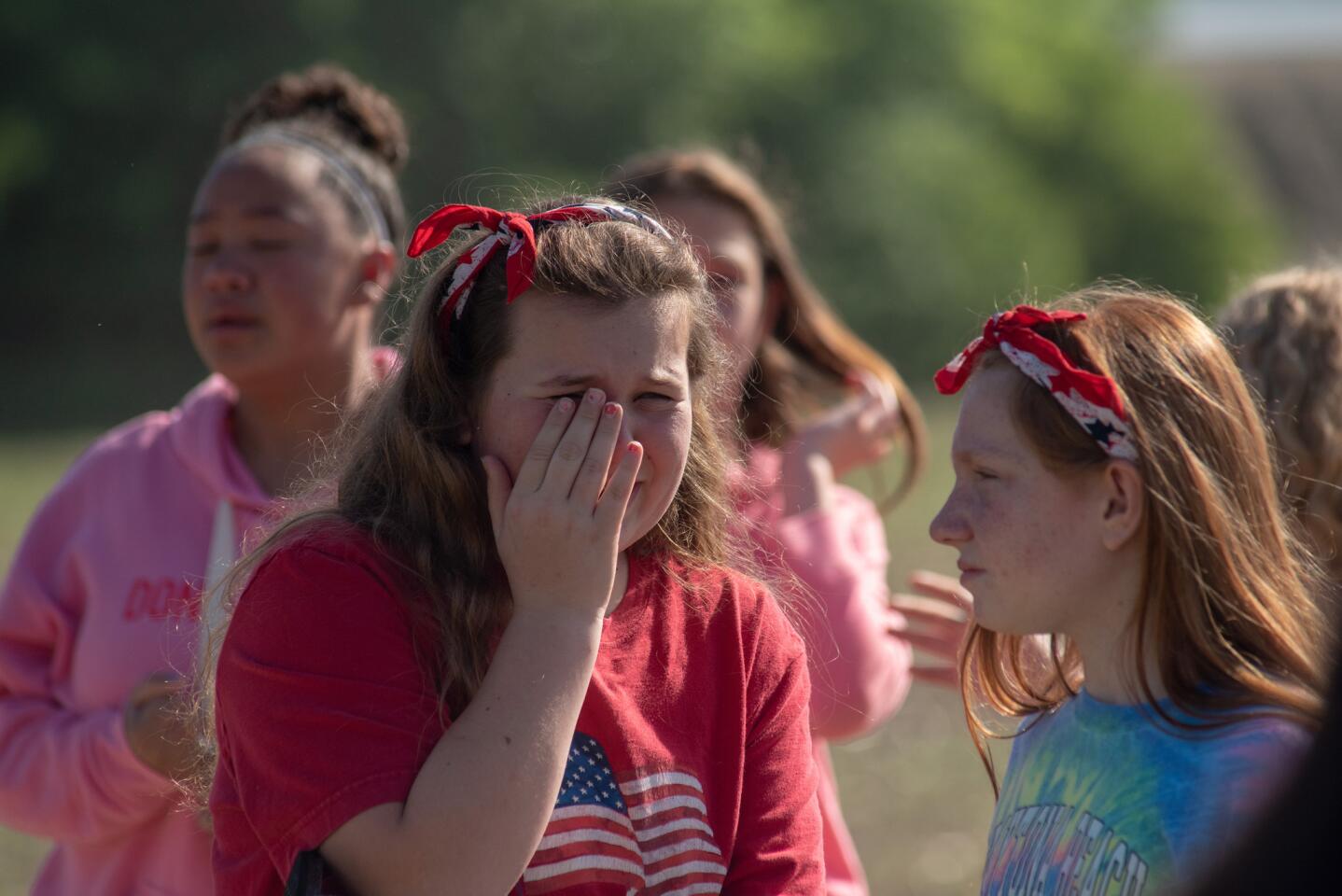 Students react outside Noblesville West Middle School after a shooting on May 25, 2018 in Noblesville, Indiana.