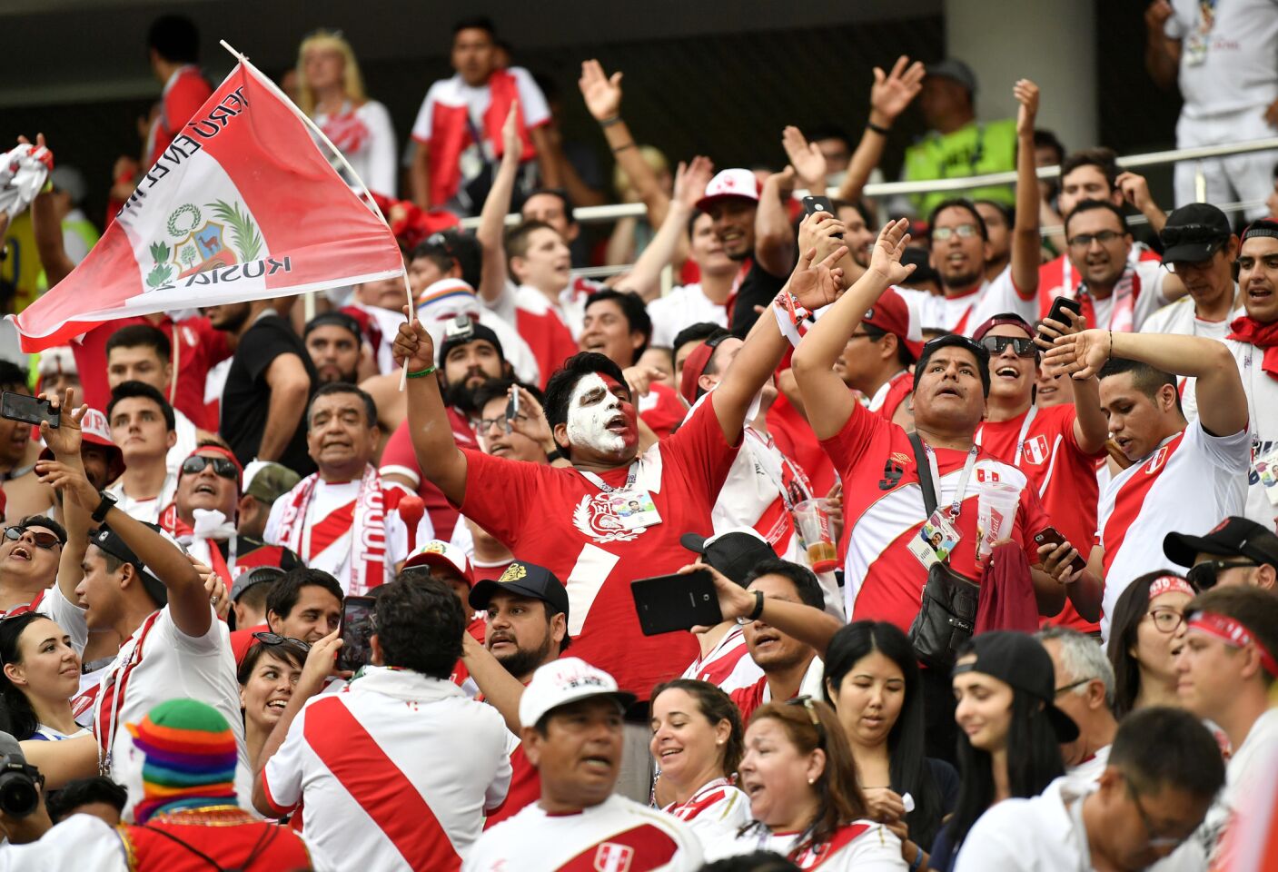 Peru fans cheer after their team won 2-0 during the group C match between Australia and Peru, at the 2018 soccer World Cup in the Fisht Stadium in Sochi, Russia, Tuesday, June 26, 2018. (AP Photo/Martin Meissner)
