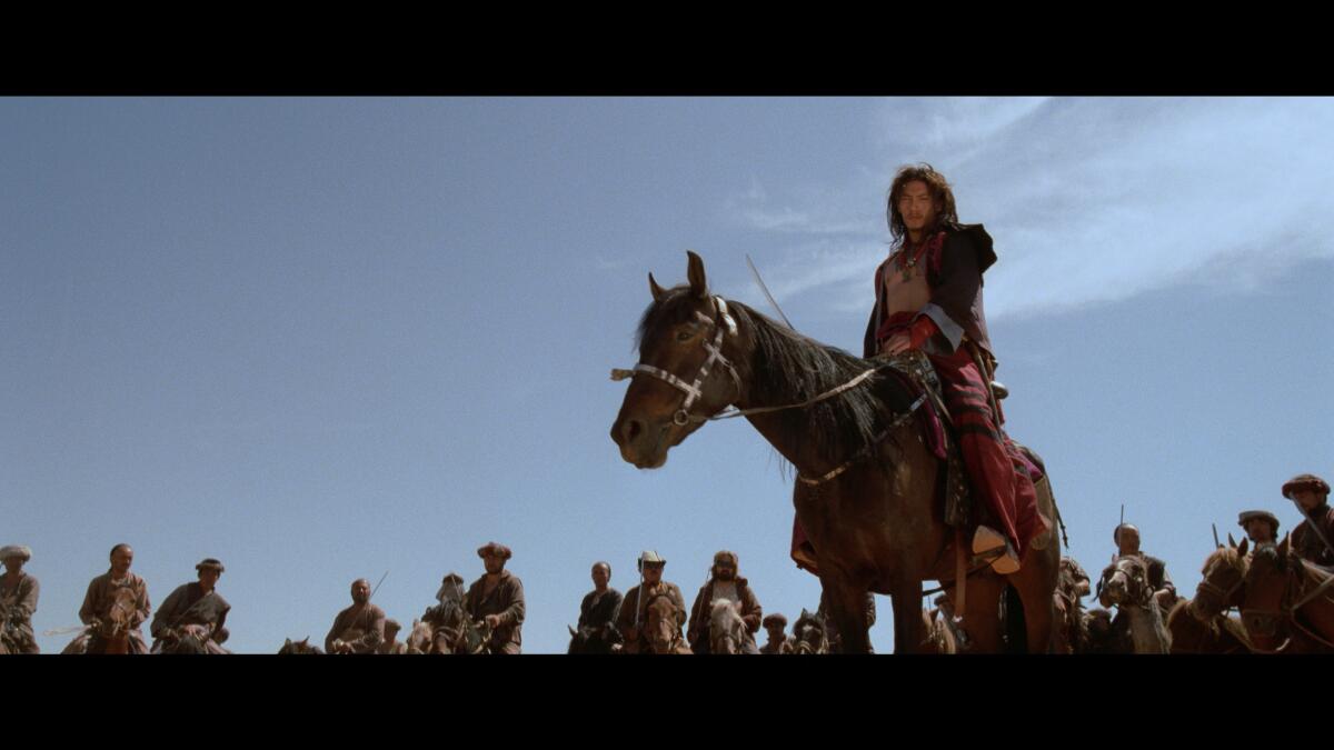 A rider on a horse in the movie "Crouching Tiger, Hidden Dragon."