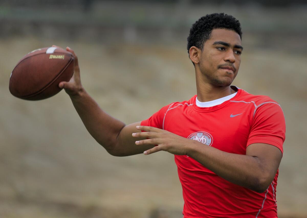 Bryce Young warms up for Mater Dei during a summer passing tournament in 2019.