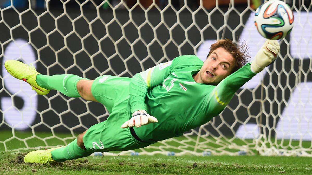 Netherlands goalkeeper Tim Krul makes a save on a penalty kick by Costa Rica during the team's World Cup quarterfinal win Saturday. Will Krul try to intimate Argentina in Wednesday's semifinal match?