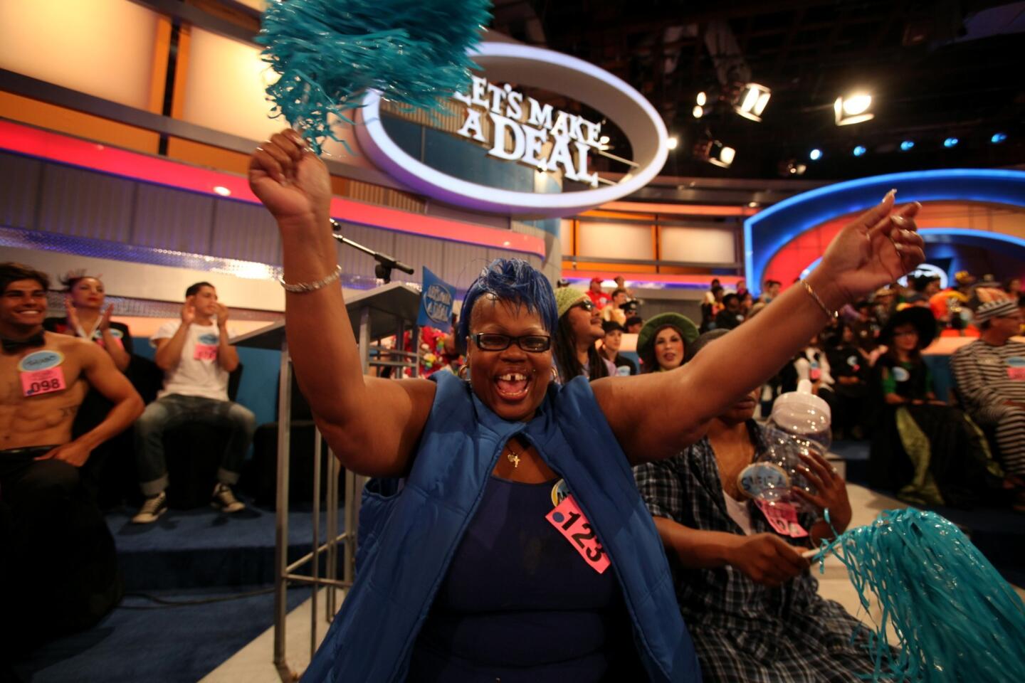 Michelle Cooper, 50, of Los Angeles is part of the colorful audience on the game show "Let's Make a Deal," taped at Sunset Bronson Studios in Hollywood. She says she has watched the program for years.