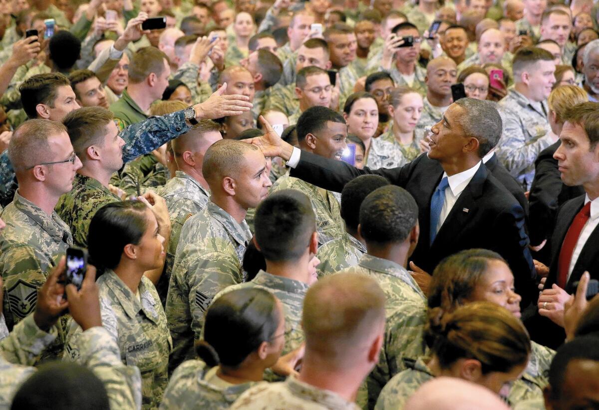 President Obama greets troops at MacDill Air Force Base in Tampa, Fla. He was at Central Command for briefings from top commanders on the U.S. strategy to battle Islamic State militants in Iraq and Syria.