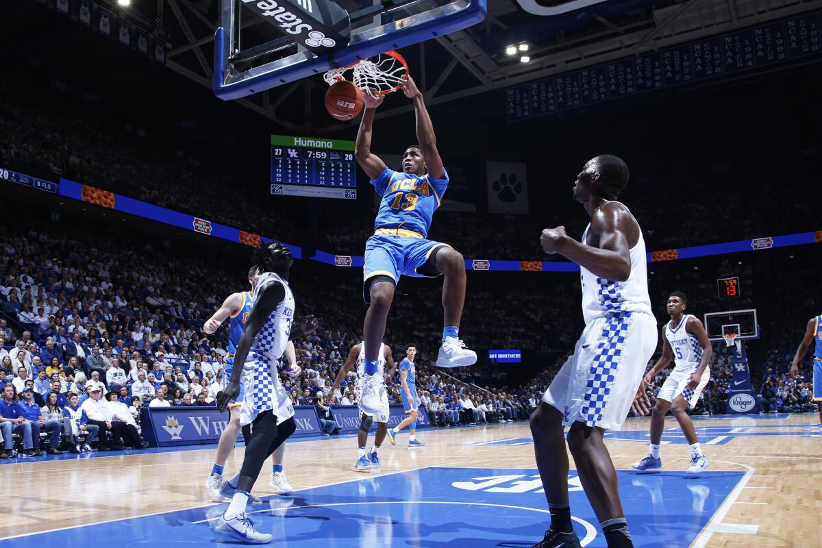 UCLA forward Ike Anigbogu throws down a dunk against Kentucky during the first half of a game last Dec. 3.