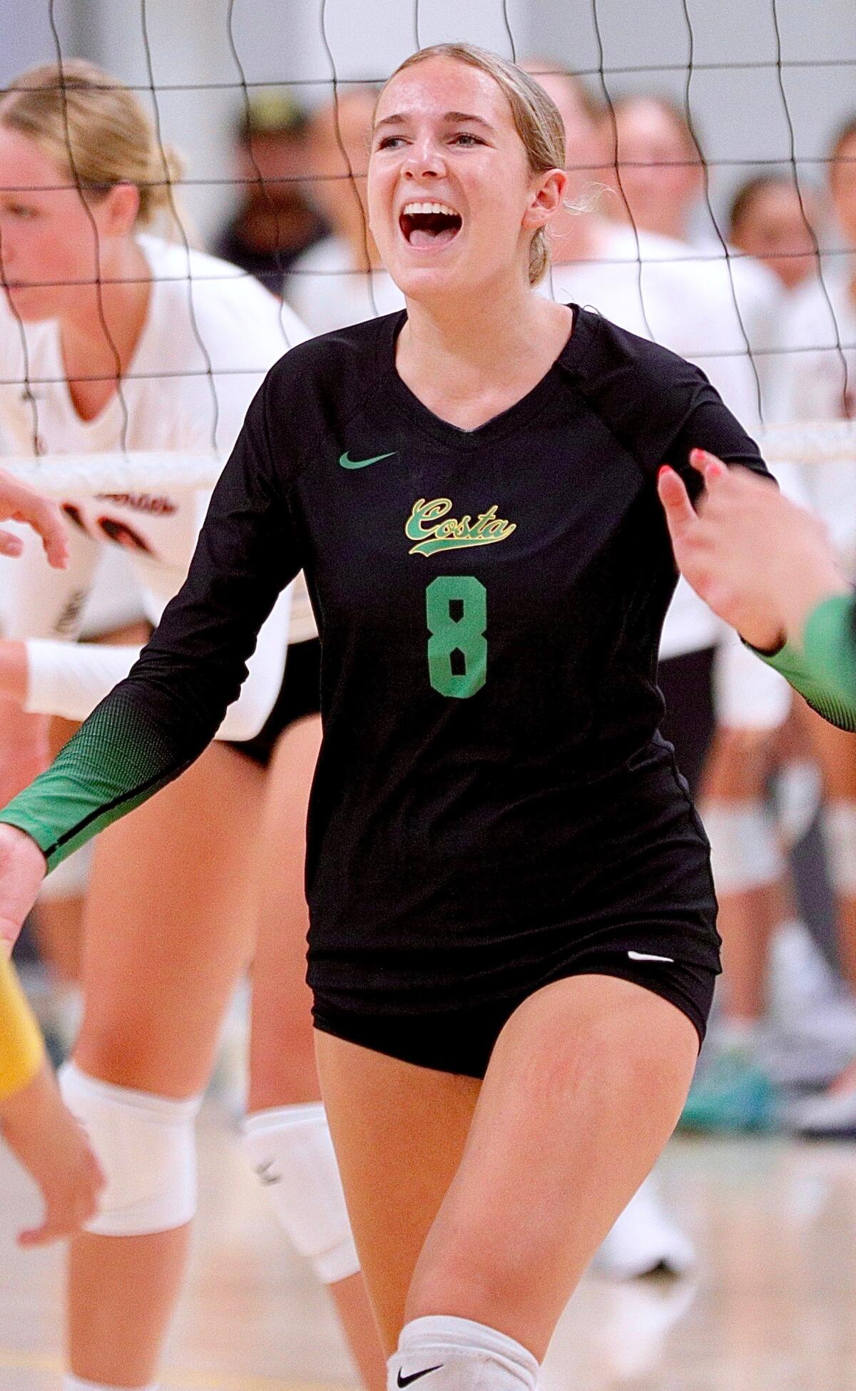 Volleyball expertise within the Bay League is off the charts 2 Mira Costa junior setter Milly McGee smiles after the Mustangs won a point