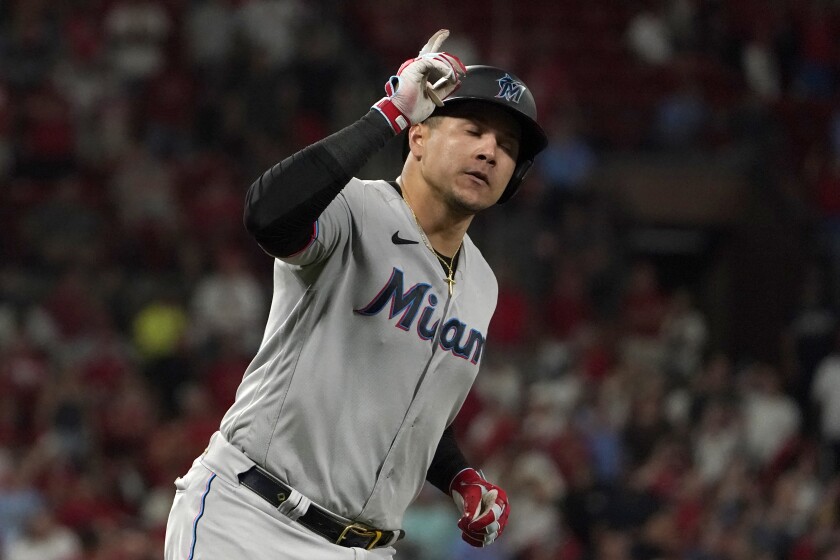 Miami Marlins' Avisail Garcia celebrates as he rounds the bases after hitting a two-run home run during the ninth inning of a baseball game against the St. Louis Cardinals Wednesday, June 29, 2022, in St. Louis. (AP Photo/Jeff Roberson)
