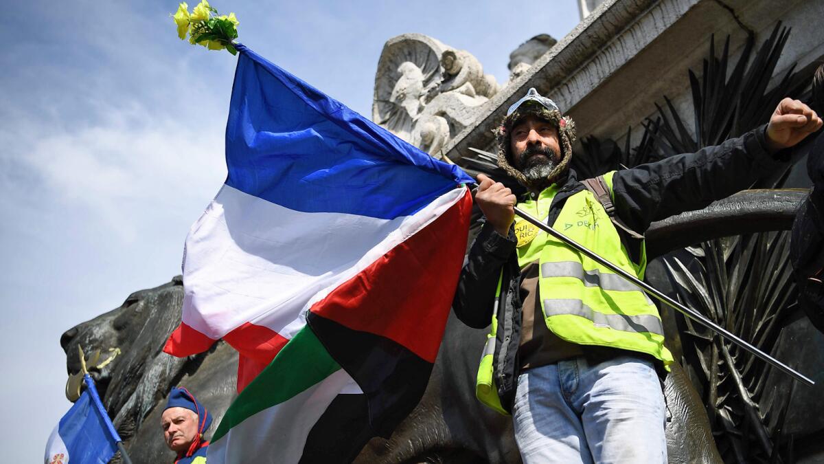 Protesters gather Saturday at Place de la Republique in Paris.
