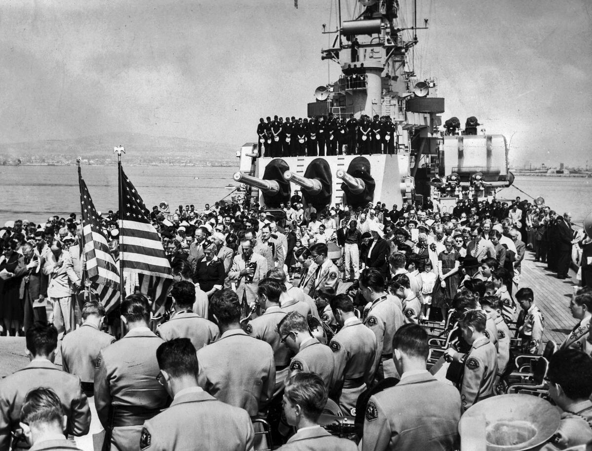 May 30, 1954: More than 500 people jam the afterdeck of the cruiser Helena for Memorial Day services. The ship was anchored three miles out from the Navy Landing in Long Beach.