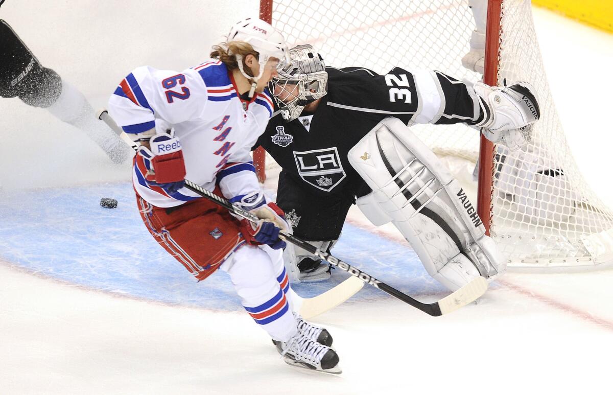 New York Rangers forward Carl Hagelin scores a short-handed goal on Kings goalie Jonathan Quick during Game 1 of the Stanley Cup Final in 2014.