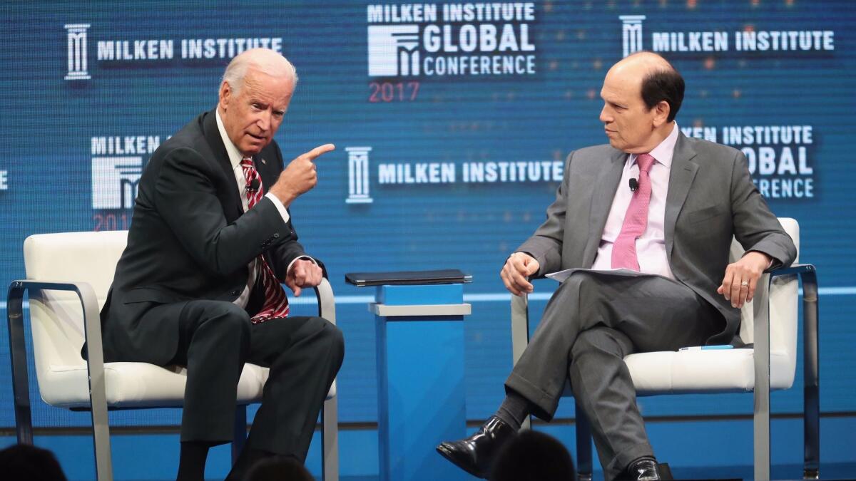 Former Vice President Joe Biden, left, and Michael Milken, chairman of the Milken Institute, during the Milken Institute Global Conference 2017 at The Beverly Hilton Hotel on May 3, 2017 in Beverly Hills.